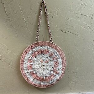 Cleobella round pink and white pom-pom bag